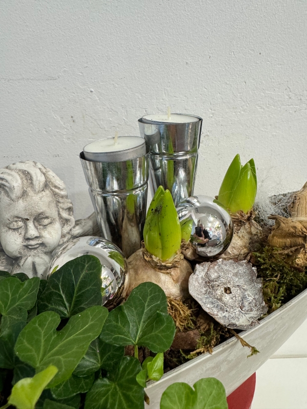 Christmas Hyacinth planted boat shape table arrangement with candle holders