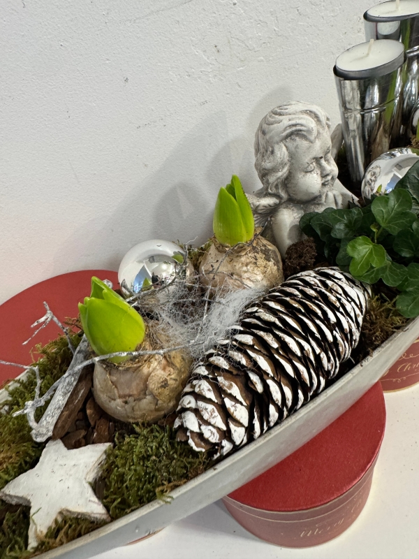 Christmas Hyacinth planted boat shape table arrangement with candle holders