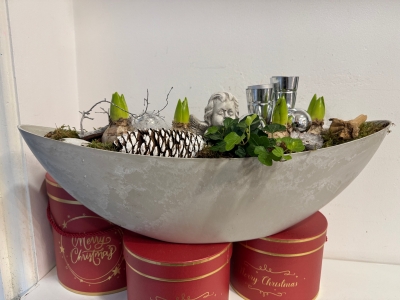 Christmas Hyacinth planted boat shape table arrangement with candle holders