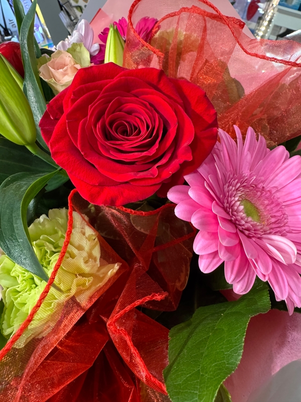 St Valentine’s Day pink euro style handtied with single red rose and heart