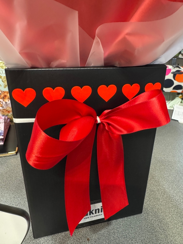 St Valentine’s Day pink euro style handtied with single red rose and heart