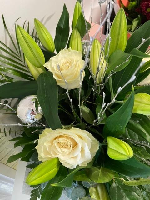 Christmas Lily and Rose handtied bouquet