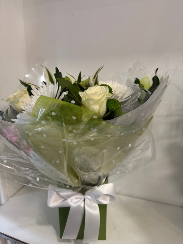 Euro Cluster handtied bouquet in water and boxed