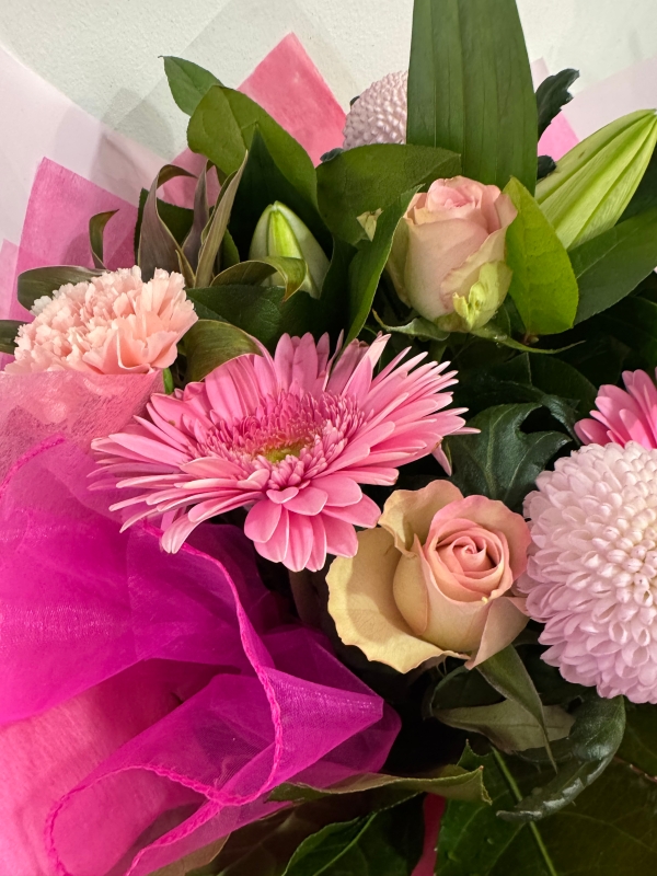 Euro Cluster handtied bouquet in water and boxed