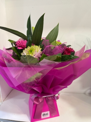 Euro Cluster handtied bouquet in water and boxed
