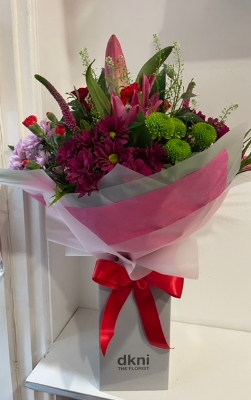 Pink and red hand tied bouquet