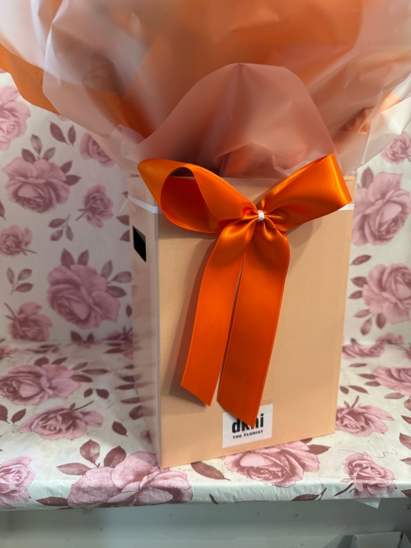 Twister Autumn orange tones handtied bouquet in gift box