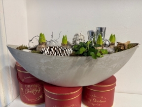 Christmas Hyacinth planted boat shape table arrangement with candle holders