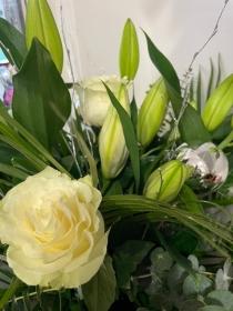 Christmas Lily and Rose handtied bouquet