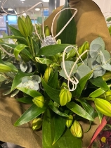 Maria’s Christmas white mini  lily handtied bouquet delivered in water  and boxed