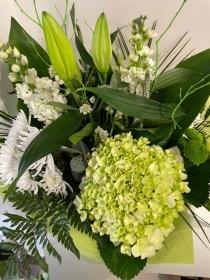 luxury white and lime handtied bouquet inc hydrangea