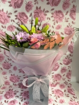 Nikos choice handtied bouquet gift wrapped into box with water