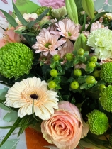 Nikos choice handtied bouquet gift wrapped into box with water