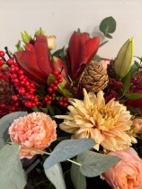 Nikos luxury Christmas handtied bouquet in Red and Bronze tones