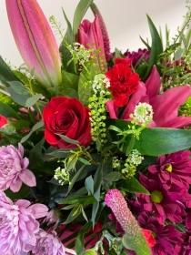 Pink and red hand tied bouquet